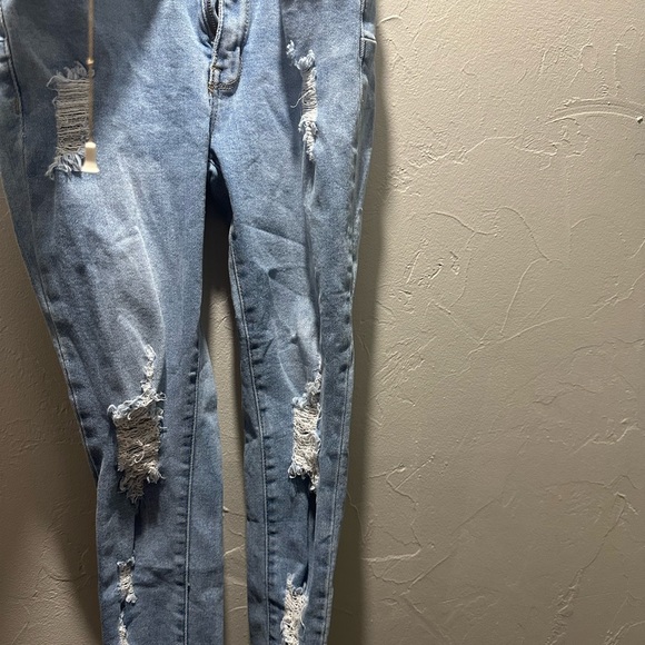 Blue Jeans With Rips - Picture 3 of 3